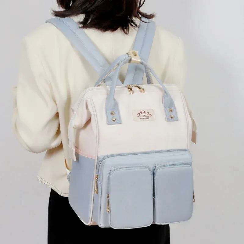 sac a langer bleu beige