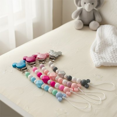 attache tetine quatre couleur