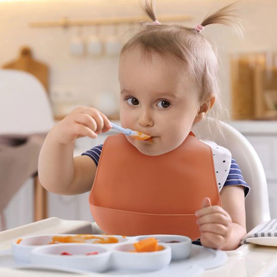 bavoir bebe orange fonce