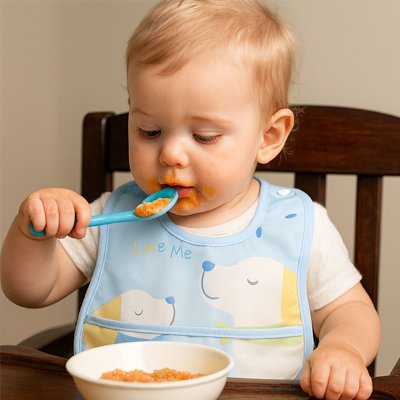 bavoir bebe mange